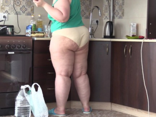 bbw housewife in the kitchen in panties and slippers