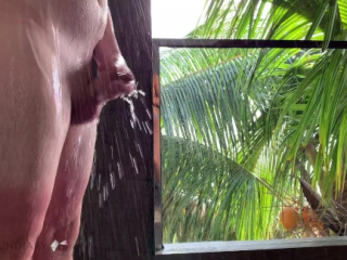 honeymoon couple taking a romantic shower after sex on paradise island