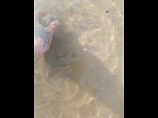 Hall of Famer playing with crabs at the beach