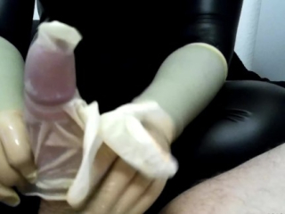 Milking in a white latex glove